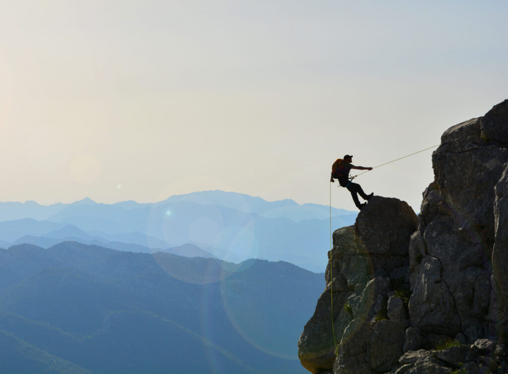 a determined mountaineer heading towards his goal