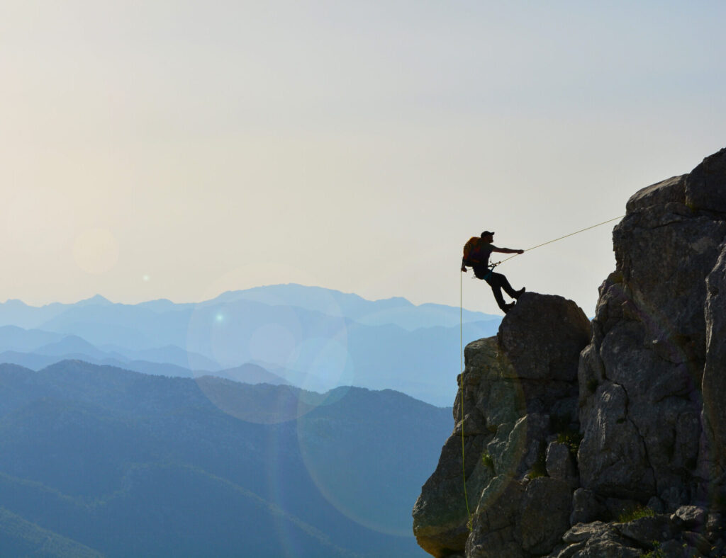 a determined mountaineer heading towards his goal